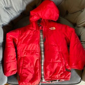 The North face reversible puffer jacket.